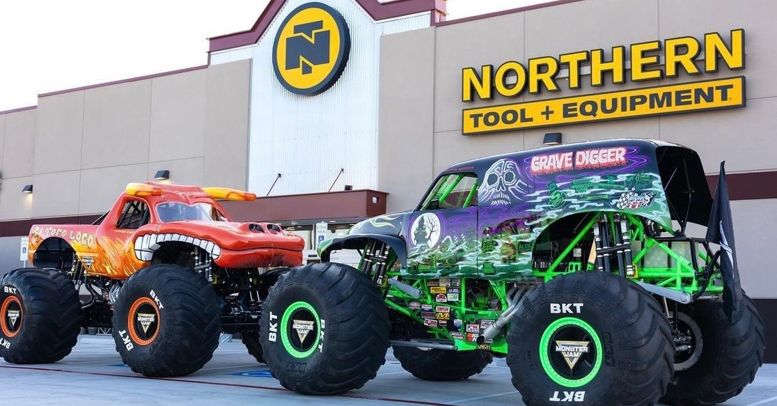 El Toro Loco and Grave Digger Monster Jam trucks parked outside of a Northern Tool + Equipment store